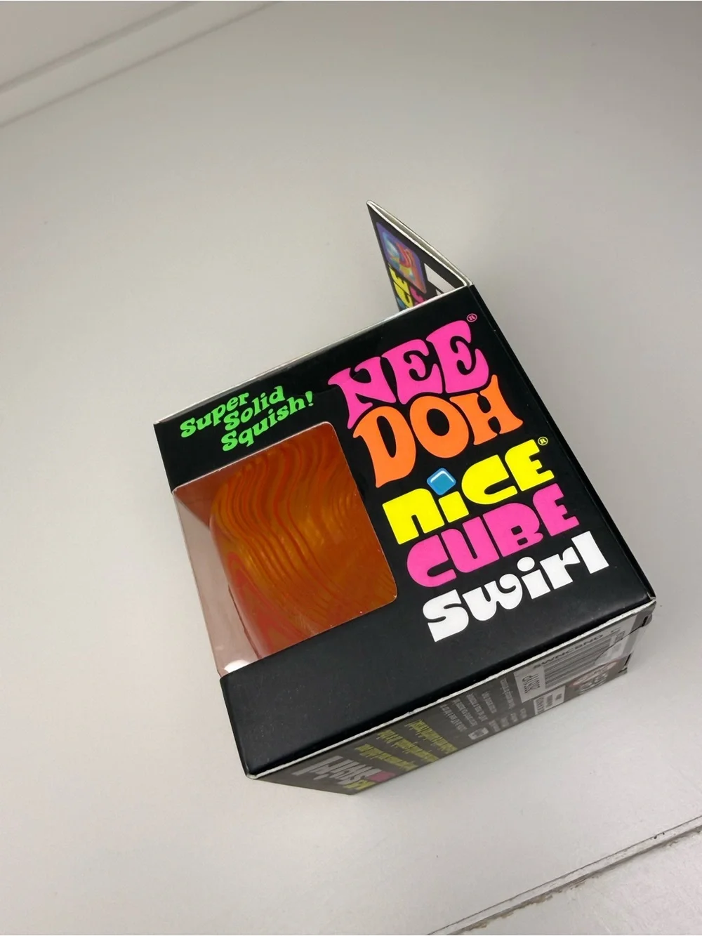 NeeDoh Nice Cube Swirl - Orange | NEE DOH Sensory Fidget Toy Super Solid Squish